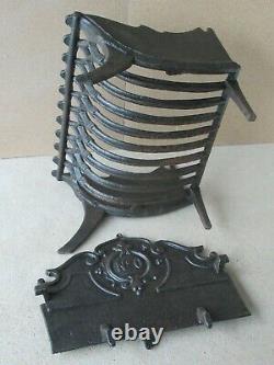 Ancien berceau grille porte bûches de cheminée en fonte, à réflecteur amovible