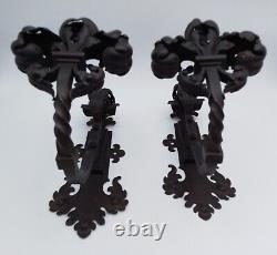 Ancienne paire d'embrases en fer forgé XIXe siècle fleurs de lys stylisés