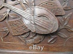 Ancienne paire de porte en chêne sculpté instrument de musique 19 eme