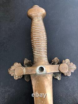 Ancienne poignee de tirage en bronze magasin militaria sabre couteau porte