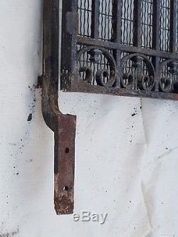 Ancienne porte d'ascenseur en fer forgé