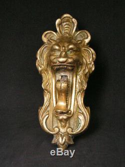 Ancienne sonnette de porte en bronze tete de lion langue articulée curiosité