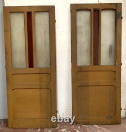 Double portes de passage en verre et sapin patiné XX siècle