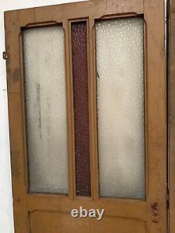 Double portes de passage en verre et sapin patiné XX siècle