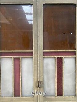 Double portes de passage en verre et sapin patiné XX siècle