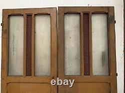 Double portes de passage en verre et sapin patiné XX siècle