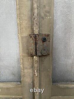Double portes de passage en verre et sapin patiné XX siècle