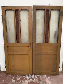 Double portes de passage en verre et sapin patiné XX siècle