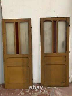 Double portes de passage en verre et sapin patiné XX siècle