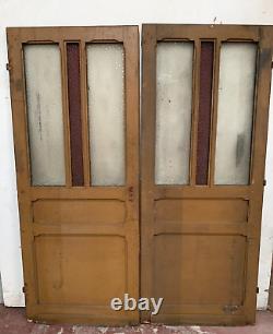Double portes de passage en verre et sapin patiné XX siècle