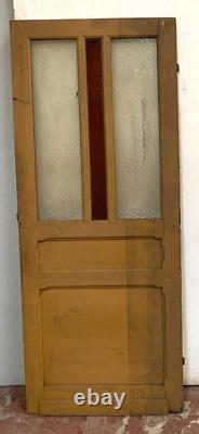 Double portes de passage en verre et sapin patiné XX siècle
