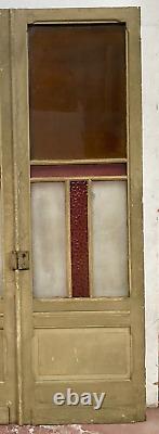 Double portes de passage en verre et sapin patiné XX siècle