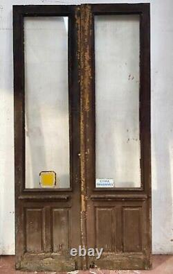Double portes de passage en verre et sapin patiné XX siècle