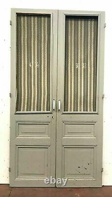 Double portes de placard Porte panneautées et grillagées XX siècle