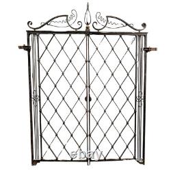 Paire de grilles en fer forgé époque 1940 dans l'esprit de Gilbert Poillerat
