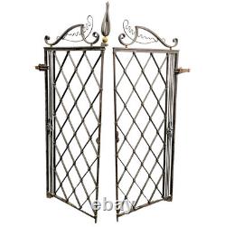 Paire de grilles en fer forgé époque 1940 dans l'esprit de Gilbert Poillerat