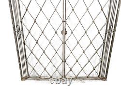 Paire de grilles en fer forgé époque 1940 dans l'esprit de Gilbert Poillerat