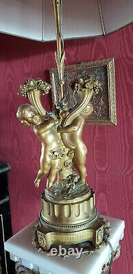 Paire de lampes en bronze doré, Deux Amours corne dabondance Epoque XIX° siècle