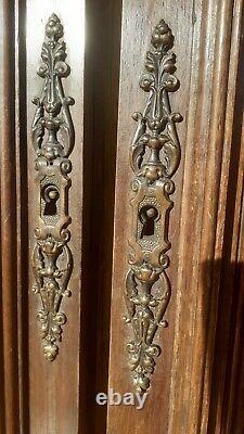Paire de petites portes de buffet de style Henri II, très beau motif de dragon