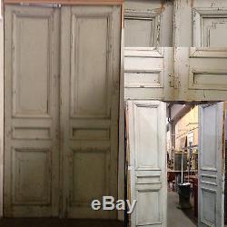 Paire de portes de séparation double faces en sapin massif moulurées XX siècle