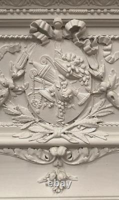 Panneau décoratif en bois stuqué motif attribue de musique. XIX siècle