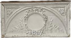 Panneau décoratif en bois stuqué motif médaillon au feuille. XIX siècle