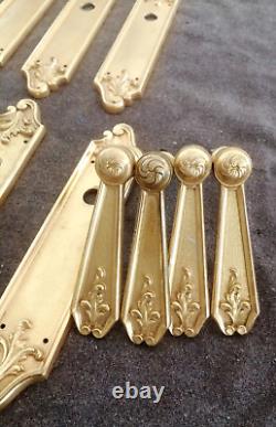 Poignées et garnitures de portes en bronze/laiton doré de style Louis XV