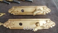 Poignées et garnitures de portes en bronze/laiton doré de style Louis XV