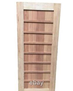 Porte ancienne en bois d'hêtre au style Art Déco, robuste et raffinée