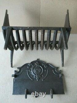 Porte bûches berceau grille ancien de cheminée, en fonte, à réflecteur amovible