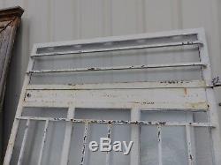 Porte d'atelier vitrée avec barres de protection année 30/haut 243 cm