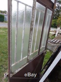 Porte d'atelier vitrée avec barres de protection année 30/haut 243 cm