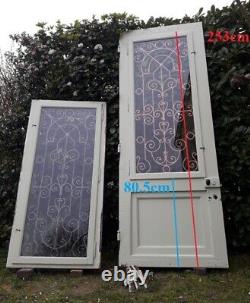 Porte d'entrée 264x99cm noyer chêne grille fer forgé panneau vitré ouvrant