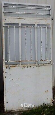 Rare porte d'atelier vitrée avec barres de protection année 30/haut 243 cm