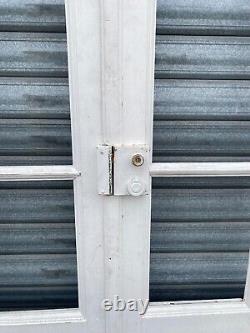 Suite de quatre portes de passage a petits carreaux XX siècle