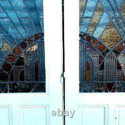 Suite de quatre portes de séparation en vitrail Art Déco XX siècle