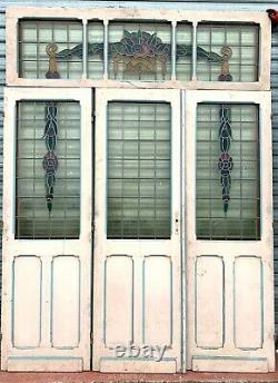Suite de trois portes de séparation en vitrail Art Déco XX siècle