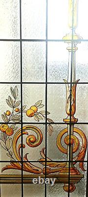 Suite de trois portes de séparation en vitrail a décor floral XX siècle